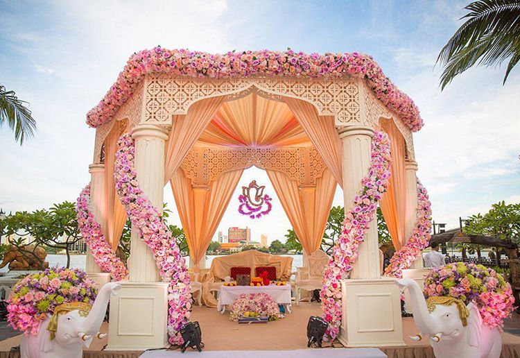floral dome and drape wedding mandap