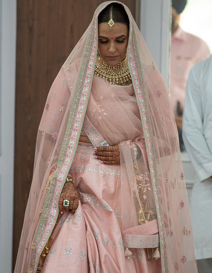 Neha-Dhupia-in-Anita-Dongre-pink-lehenga